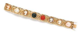 * A Yellow Gold and Multi Stone Cameo Bracelet, 28.50 dwts.