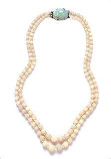 * A Graduated Double Strand Opal Bead Necklace, 42.60 dwts.