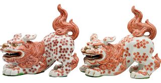 Pair of Porcelain Bowing Foo Dogs