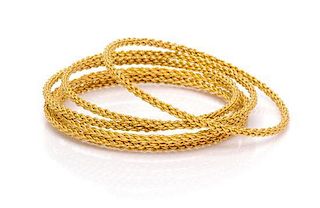 * A Collection of Yellow Gold Bangle Bracelets, 35.10 dwts.