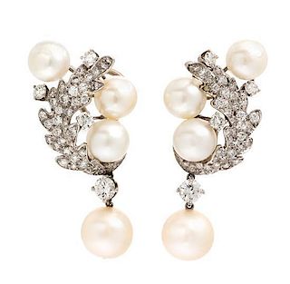 A Pair of Platinum, Cultured Pearl and Diamond Earclips, 10.80 dwts.
