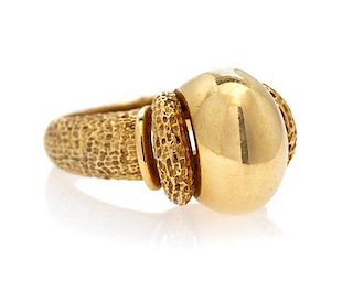 * An 18 Karat Yellow Gold Ring, 9.80 dwts.