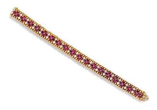 An 18 Karat Yellow Gold, Ruby and Diamond Bracelet, Circa 1960, 45.60 dwts.