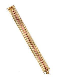 An 18 Karat Yellow Gold and Ruby Bracelet, Van Cleef & Arpels, Circa 1960, 51.00 dwts.
