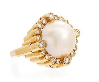 * An 18 Karat Yellow Gold, Mabe Pearl and Diamond Ring, 15.20 dwts.