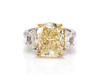A Platinum, 18 Karat Yellow Gold, Colored Diamond and Diamond Ring, 8.20 dwts.