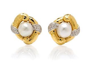 A Pair of 18 Karat Gold, Cultured Pearl and Diamond Earclips, 19.40 dwts.