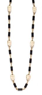 An 18 Karat Yellow Gold, Onyx and Coral Longchain Necklace, 76.10 dwts.