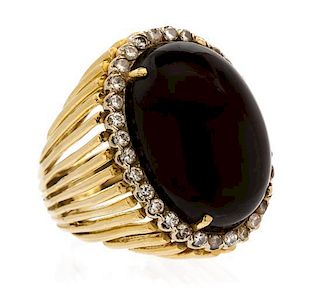 * A Yellow Gold, Onyx and Diamond Ring, 18.90 dwts.