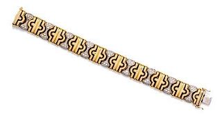 A Two Tone Gold and Diamond Bracelet, 36.10 dwts.
