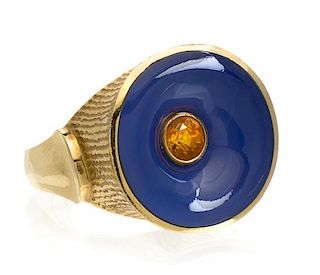 * An 18 Karat Yellow Gold, Blue Chalcedony and Citrine Ring, 11.70 dwts.