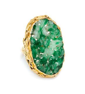 A 22 Karat Yellow Gold and Carved Jade Ring, 7.70 dwts.