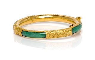 * A High Karat Gold and Jade Bangle Bracelet, 20.70 dwts.