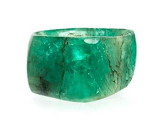 * A Carved Emerald Hololith Ring, 7.40 dwts.