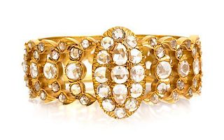 * A 22 Karat Yellow Gold and Diamond Peranakan Bangle Bracelet, Chinese, Circa 1920, 37.40 dwts.