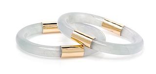 * A Pair of Yellow Gold and Icy Jadeite Jade Bangle Bracelets,
