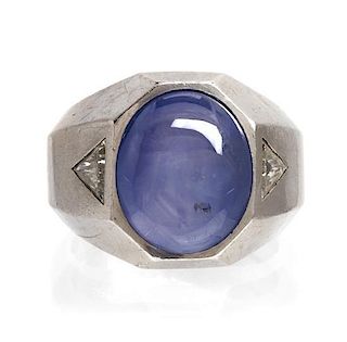 A Platinum, Star Sapphire and Diamond Ring, 22.60 dwts.