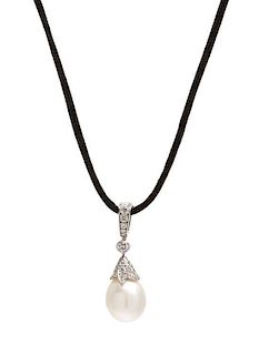 A Platinum, Cultured Pearl and Diamond Pendant, Cartier, 7.50 dwts.