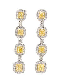 A Pair of 18 Karat White Gold, Colored Diamond and Diamond Drop Earrings, 7.40 dwts.