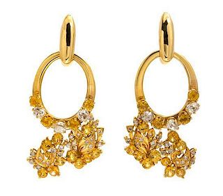 * A Pair of Yellow Gold, Diamond and Yellow Sapphire Earclips, 14.30 dwts.