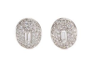 A Pair of Platinum and Diamond Earclips, Circa 1950, 7.90 dwts.