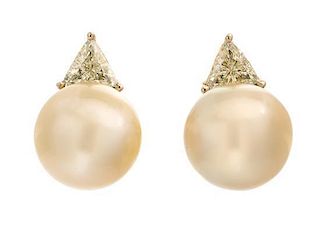* A Pair Yellow Gold, Cultured Golden South Sea Pearl and Colored Diamond Earclips, 8.20 dwts.