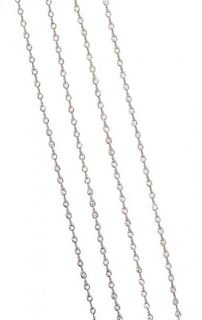 * A Platinum and Diamond Longchain Necklace, 15.10 dwts.