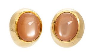 * A Pair of 18 Karat Yellow Gold and Catseye Moonstone Earclips,  23.00 dwts.