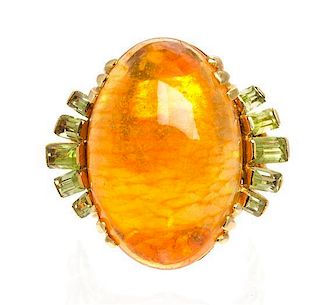 * An 18 Karat Yellow Gold, Fire Opal and Peridot Ring, 6.30 dwts.
