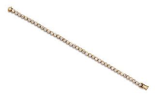An 18 Karat Yellow Gold and Diamond Line Bracelet, 9.50 dwts.