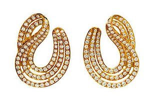 A Pair of 18 Karat Yellow Gold and Diamond Earclips, 14.00 dwts.