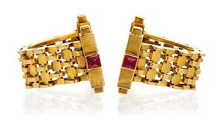 A Pair of 18 Karat Yellow Gold and Ruby Cufflinks, French, 10.40 dwts.