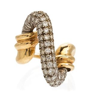 * A Two Tone Gold and Diamond Ring, 9.40 dwts.