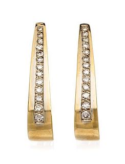 A Pair of 14 Karat Yellow Gold and Diamond Earclips, 5.90 dwts.