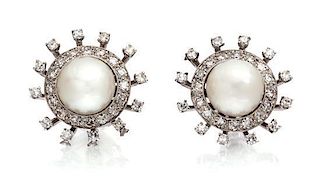 A Pair of White Gold, Cultured Pearl and Diamond Earrings, 7.60 dwts.