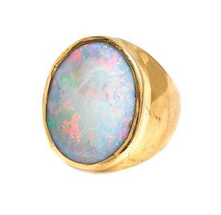 A 14 Karat Yellow Gold and White Opal Ring, 21.40 dwts.