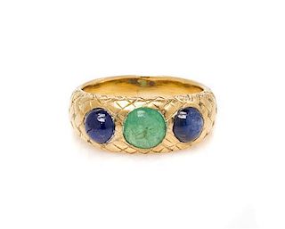 * An 18 Karat Yellow Gold, Sapphire and Emerald Ring, 4.90 dwts.
