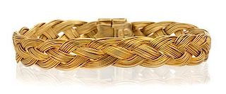 * An 18 Karat Yellow Gold Bangle Bracelet, Henry Dunay, 20.00 dwts.