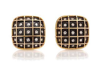 A Pair of 18 Karat Yellow Gold, Steel and Diamond Earclips, Gio Coneli, 11.40 dwts.