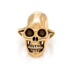 A 14 Karat Yellow Gold Skull Ring. 14.90 dwts.