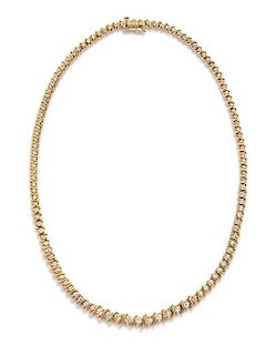 A 14 Karat Yellow Gold and Diamond Riviera Necklace, 23.20 dwts.