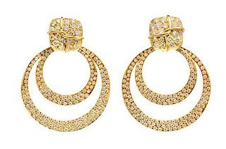 * A Pair of 18 Karat Yellow Gold and Diamond Earclips, Jose Hess, with Detachable Yellow Gold and Diamond Accents, 18.30 dwts.