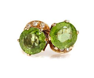 A Yellow Gold, Peridot and Diamond Toi et Moi Ring, 4.30 dwts.