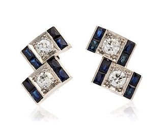 A Pair of Platinum, Diamond and Synthetic Sapphire Earrings, 3.90 dwts.