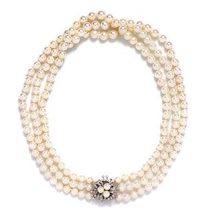 A 14 Karat White Gold, Diamond and Cultured Pearl Triple Strand Necklace,