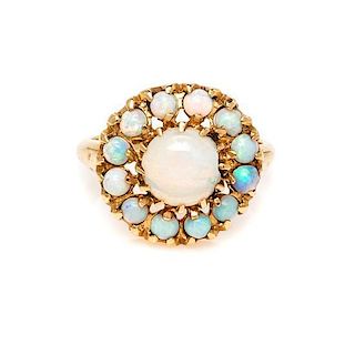* A 14 Karat Yellow Gold and Opal Ring, 2.90 dwts.