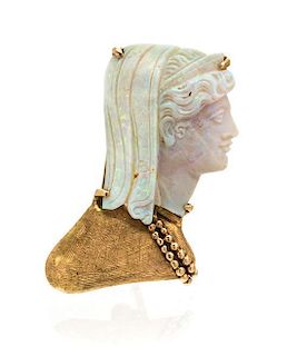 * A Yellow Gold and Opal Cameo Brooch, 5.60 dwts.