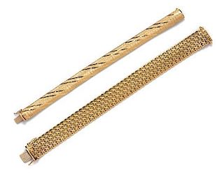 A Collection of 14 Karat Yellow Gold Bracelets, 65.10 dwts.
