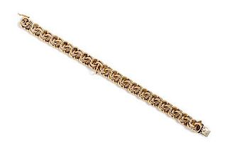 A 14 Karat Yellow Gold Double Link Bracelet. 28.70 dwts.