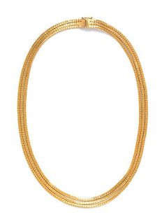 An 18 Karat Yellow Gold Triple Strand Omega Necklace, 34.20 dwts.